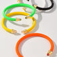 Neon Cable Bracelets in colors black, neon green, yellow, orange.