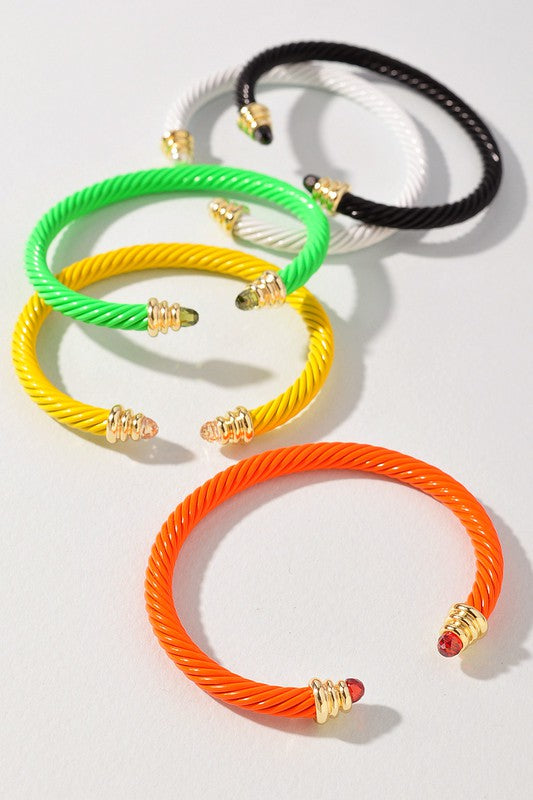 Neon Cable Bracelets in colors black, neon green, yellow, orange.